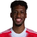 K. Coman